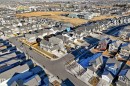 View of property location with nearby suburban area