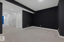 Unfurnished room with light carpet and recessed lighting