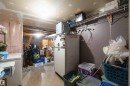 Unfinished basement area featuring drywall ceiling sections and exposed ceiling joists