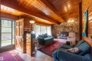 Vaulted wood-paneled ceiling with exposed beams