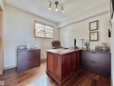 Dedicated office space with wood-finish flooring