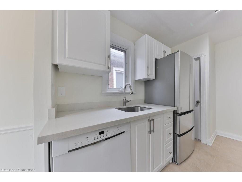 









409


Mortimer

Avenue,
Toronto,




ON
M4J 2E8

