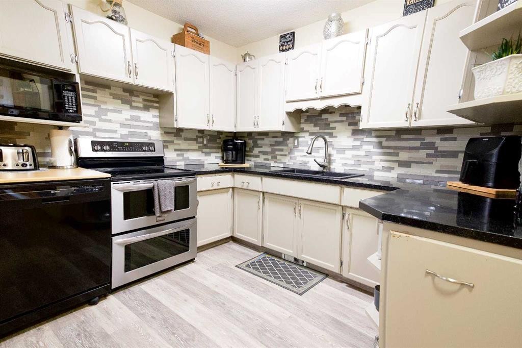 









46


Wells

Street,
Red Deer,




AB
T4N5Y3

