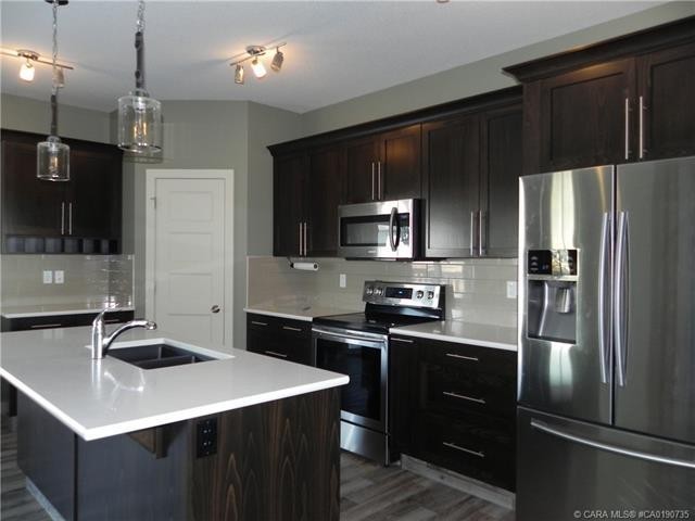 









18


CROSS

Street,
Lacombe,




AB
T4L 0J4

