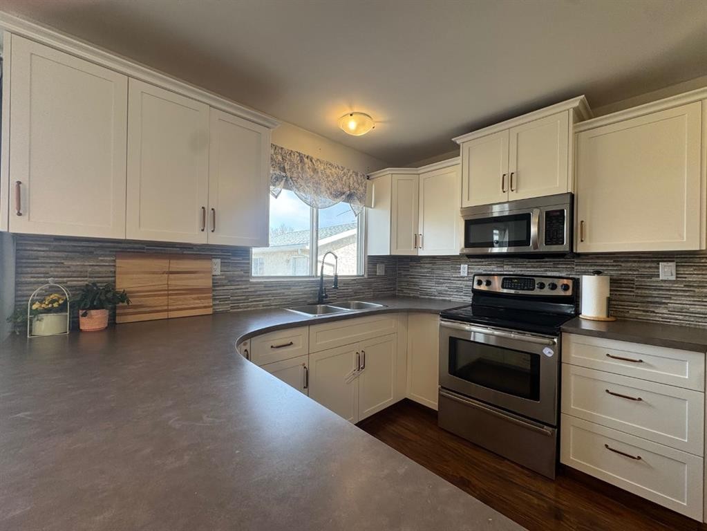 









5718


Marler

Drive,
Camrose,




AB
T4V 2S8

