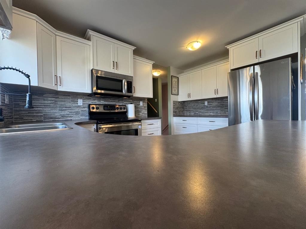 









5718


Marler

Drive,
Camrose,




AB
T4V 2S8

