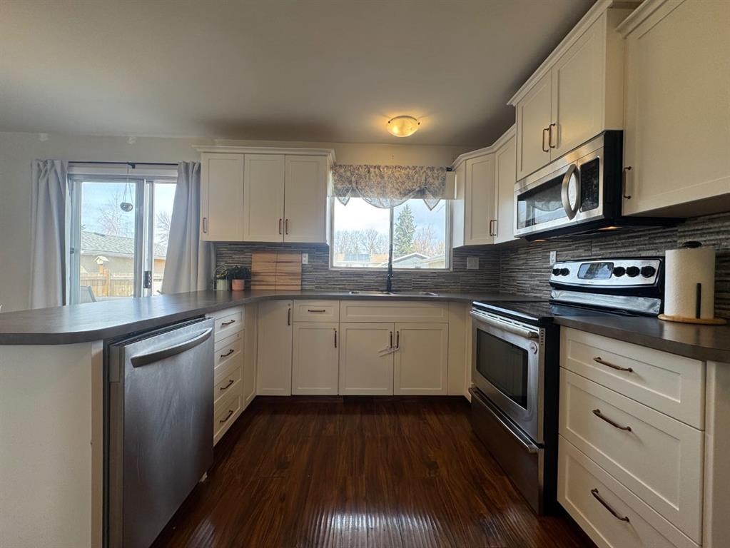 









5718


Marler

Drive,
Camrose,




AB
T4V 2S8


