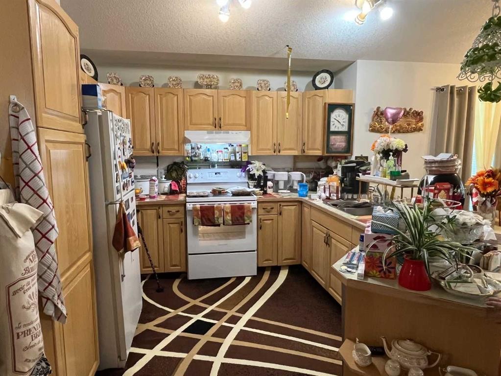 









125S


150

 West,
Raymond,




AB
T0K 2S0

