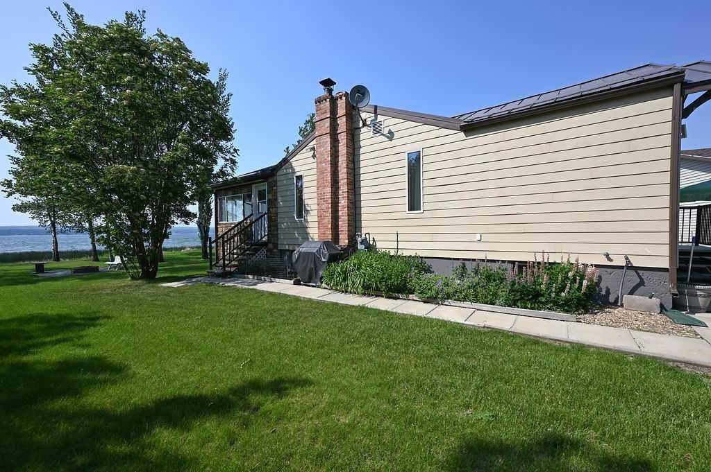 









313


Willow

Drive,
Sunset Beach,




AB
T9S 1R6

