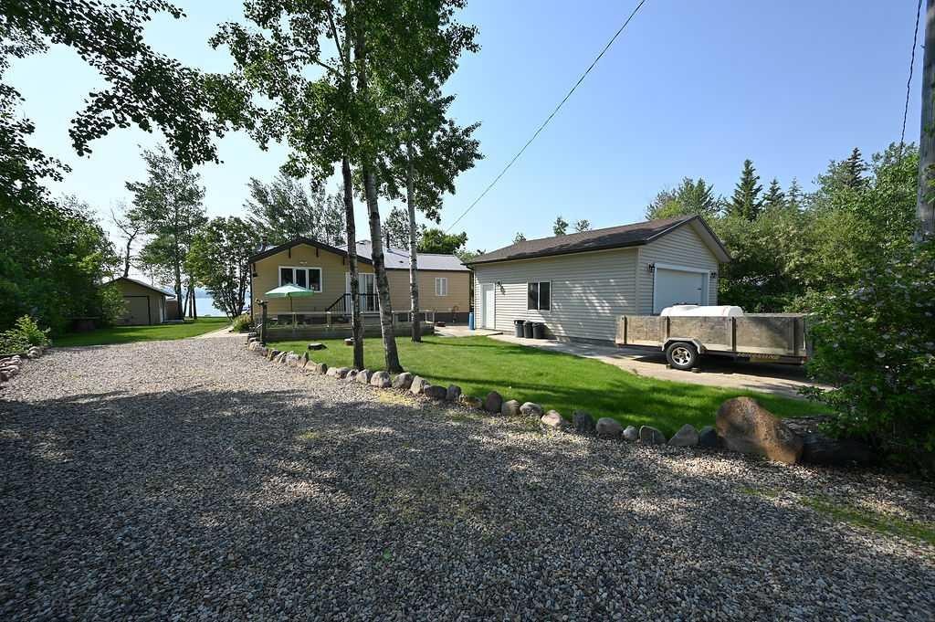 









313


Willow

Drive,
Sunset Beach,




AB
T9S 1R6

