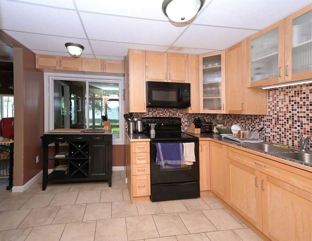 









313


Willow

Drive,
Sunset Beach,




AB
T9S 1R6

