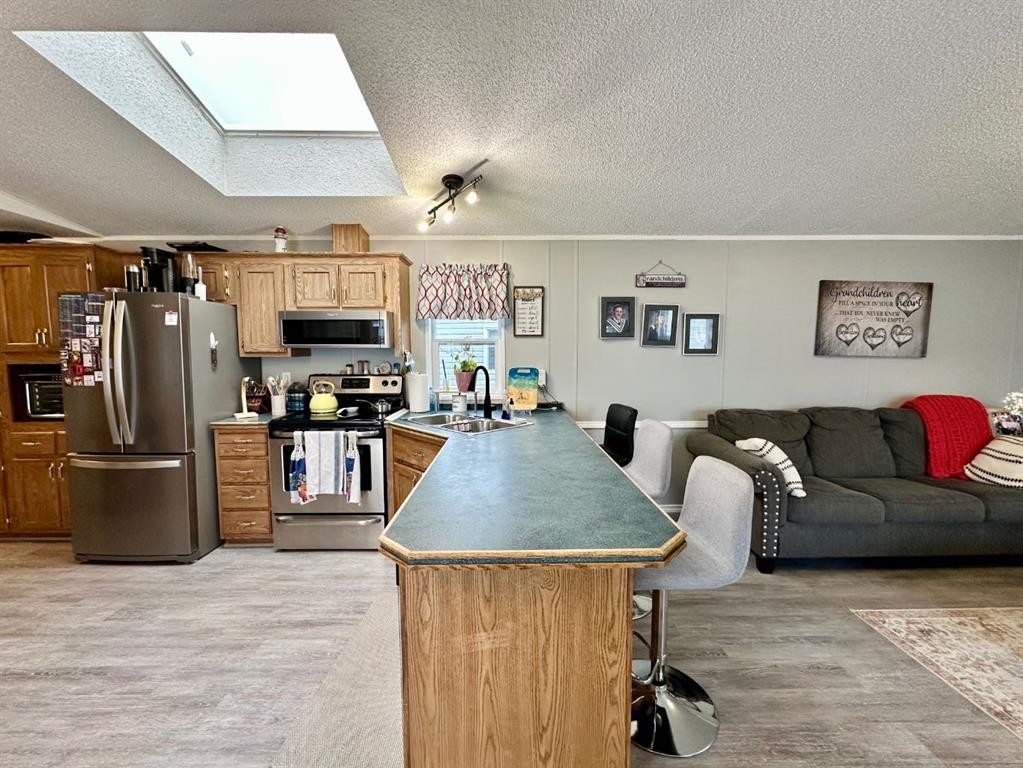 









43


Maple

Drive,
Brooks,




AB
T1R 1J2

