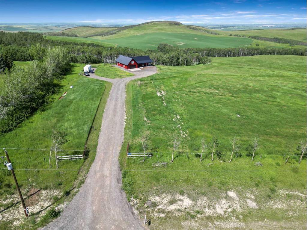 









64228


306

Avenue West,
Rural Foothills County,




AB
T1S 7A6

