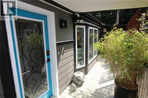 Spacious covered entrance off the 35' x 8' side deck