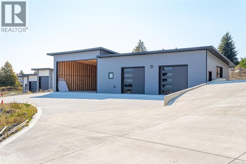 This property includes a detached workshop/heated garage w/outlet for RV and a two piece bathroom.