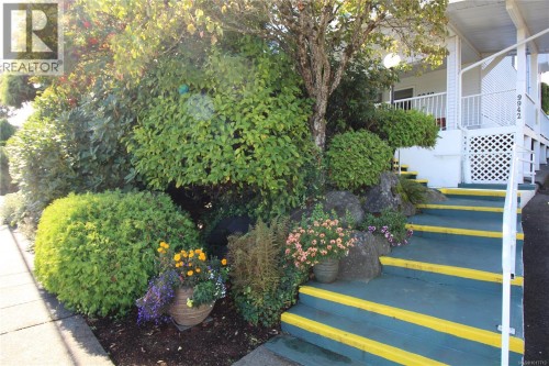 Front steps from sidewalk leading to the front entrance.