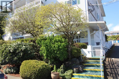 Front steps from sidewalk leading to the front entrance.