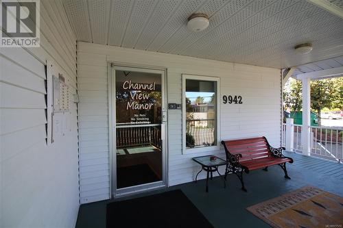 Covered porch at entrance.