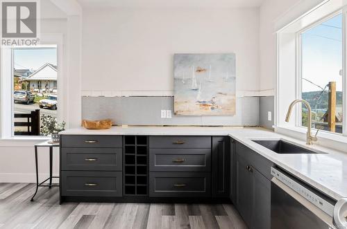 Vancouver Island marble countertops, soft-close Eurorite cabinets