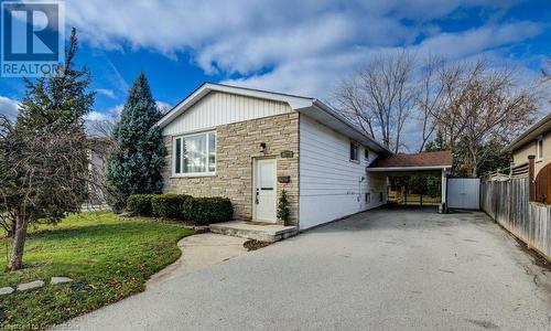 WELCOME to 582 Chamberlain Rd carport and a front lawn