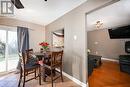 Dining room with light hardwood / wood-style flooring