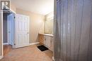 Bathroom with vanity and tile patterned floors