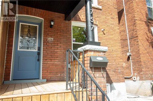 Property entrance with brick siding