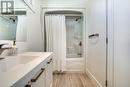 Full bath with vanity and shower / tub combo with curtain