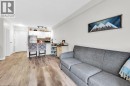 Living area with light wood finished floors