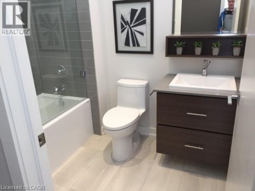 Full bathroom with vanity and combined bath / shower with glass door