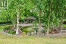 Park-like grounds with a serene Zen-inspired feel, creating a true private oasis