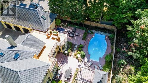 Aerial view highlighting the upper deck and the pool and entertaining areas