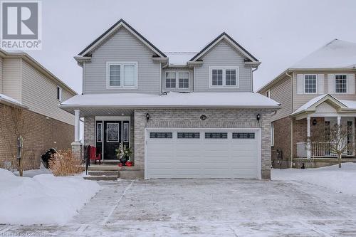 View of property with a garage