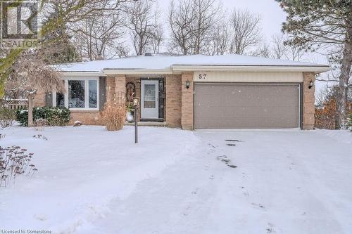 Single story home featuring a garage