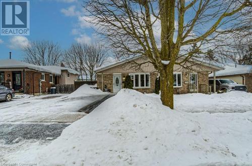 View of front of home featuring central AC unit