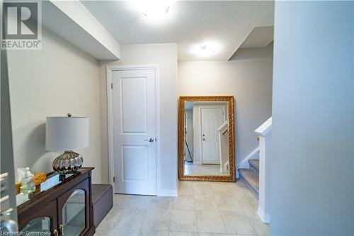 Hallway with a textured ceiling