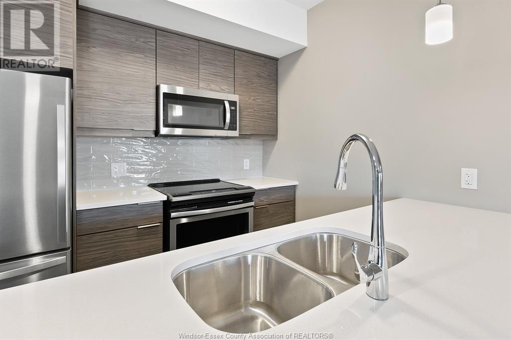 












716 BROWNSTONE Unit# 406

,
Tecumseh,




Ontario
N9K0C3

