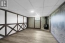 Cozy family room in basement w/ gas stove