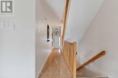 Hallway - access to basement and 2nd floor