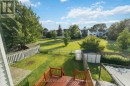 Fenced backyard - garden virtually removed