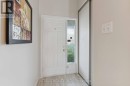 Foyer w access to garage and powder room