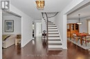 Expansive Foyer with Gleaming Wood Floors