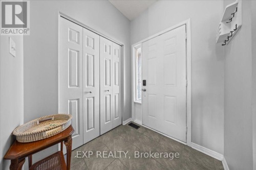 Front entry, tile with closet, garage access