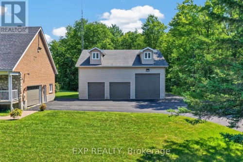 2 car attached + 4 door detached garages