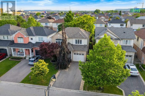 3-car driveway with single car garage