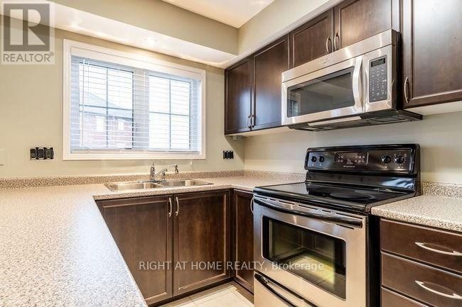 












15 - 2468 POST ROAD

,
Oakville (RO River Oaks),




Ontario
L6H0J2

