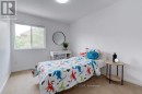 Fourth Bedroom - serene, facing backyard.