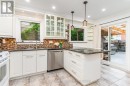 Kitchen with walk out to backyard