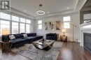 O/C great room with wall of windows and gas f/p -