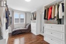 Spacious walk in closet with window
